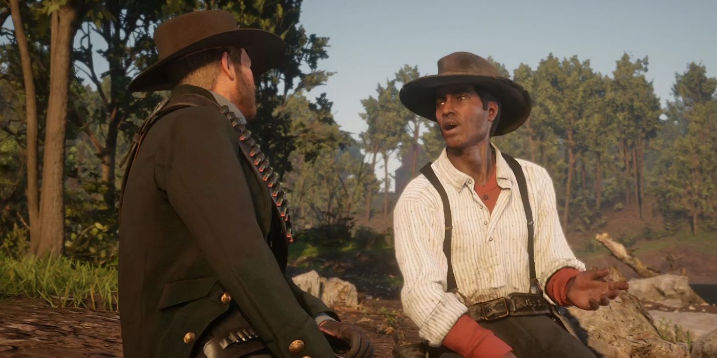 Arthur talking to Lenny sat in camp