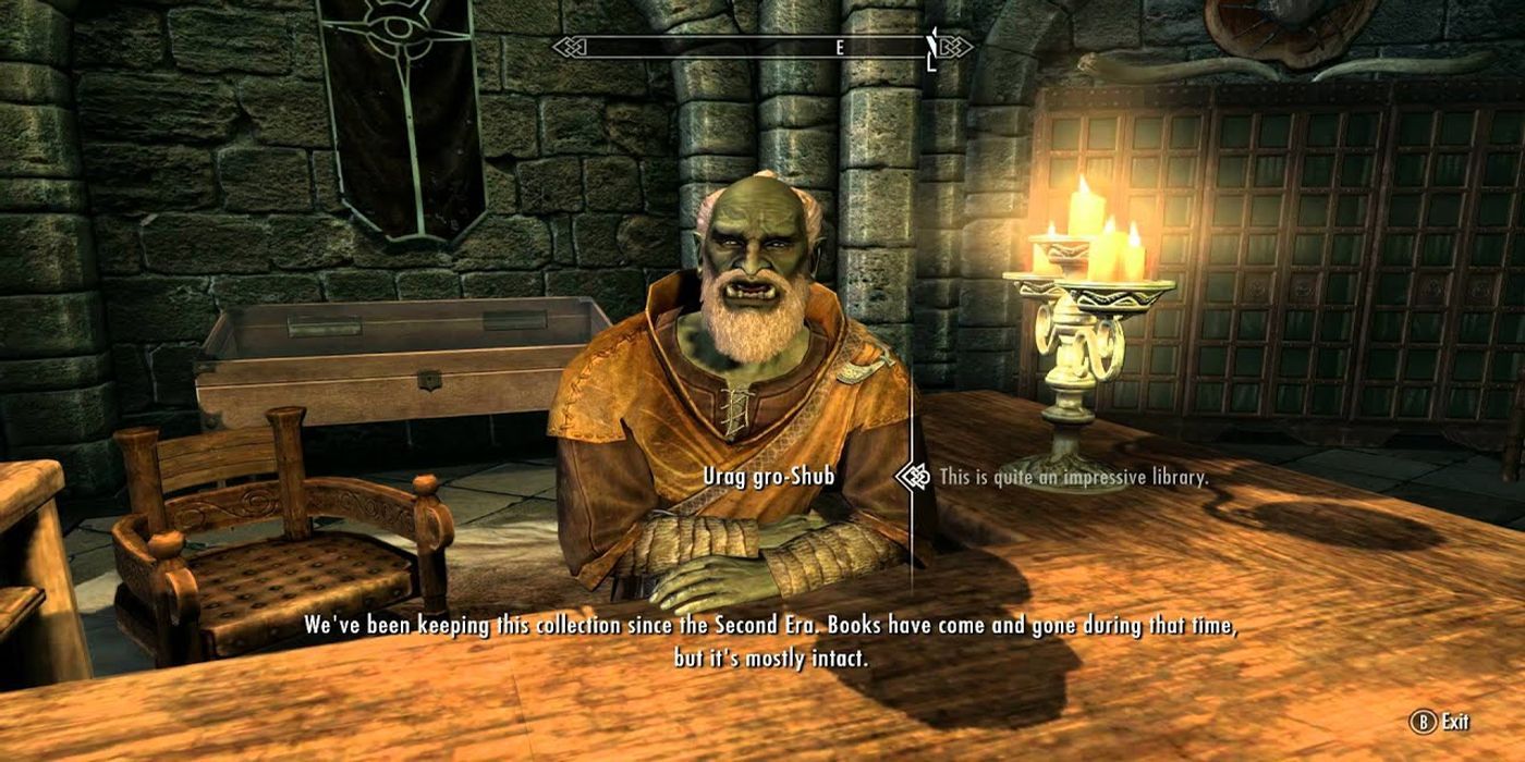 Urag Gro-Shub, librarian of the College of Winterhold, within his library, and speaking to players