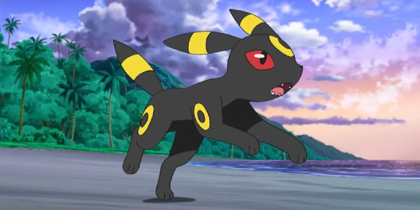 Umbreon running across a beach as the sun sets with a verdant forest in the background.