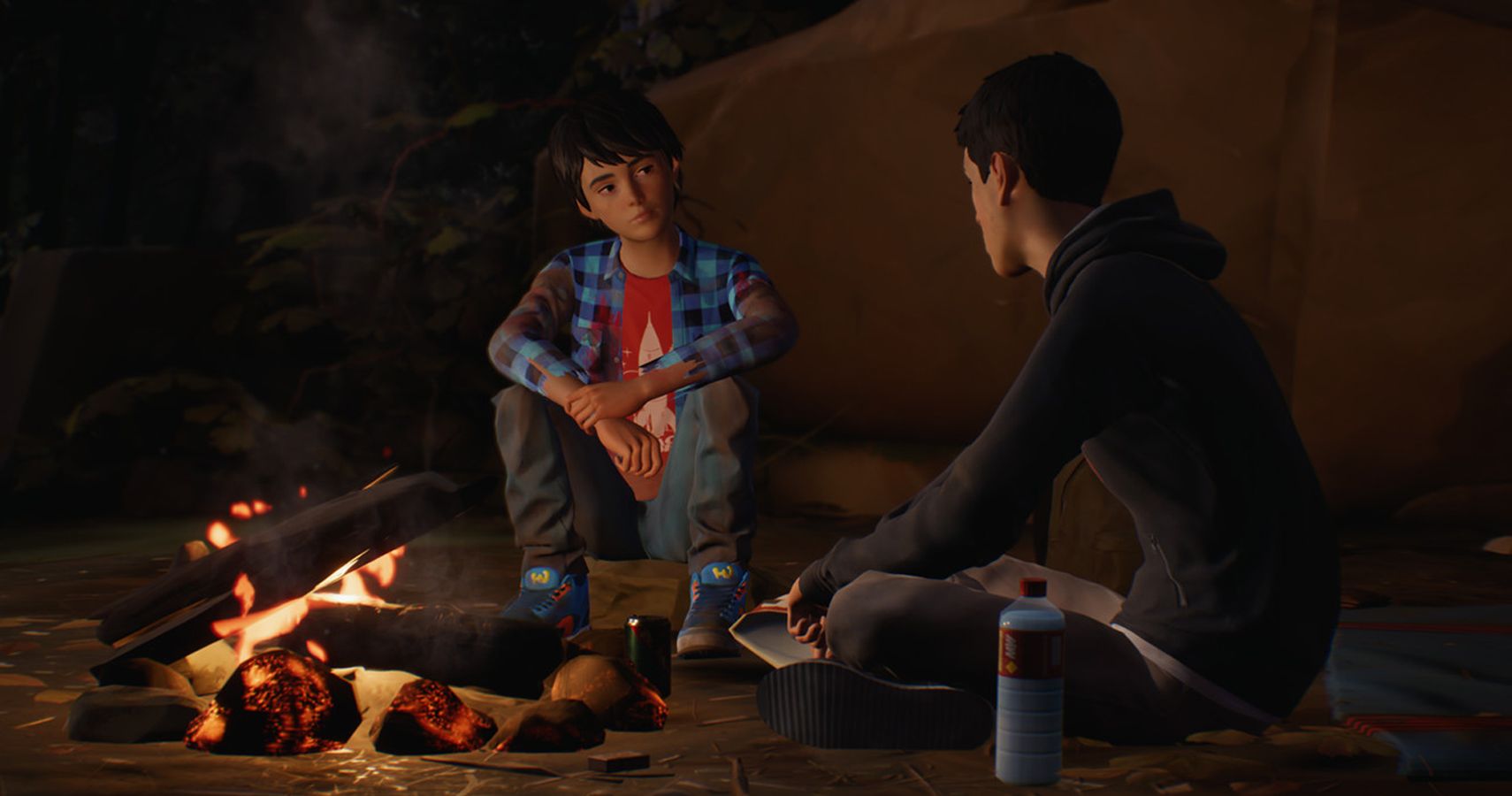Life Is Strange 2 Screenshot Of Daniel And Sean Talking At Campfire