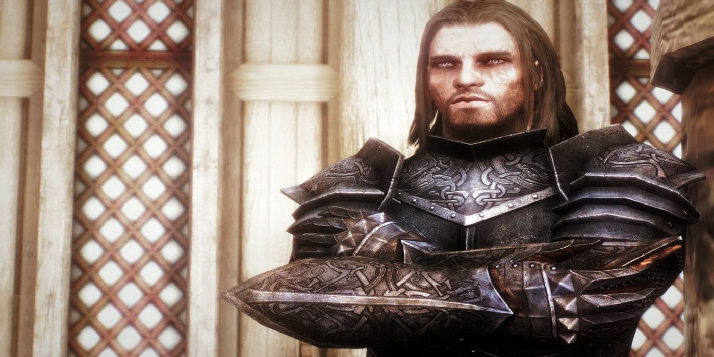 Skyrim character Farkas with his arms crossed looking at the player. 