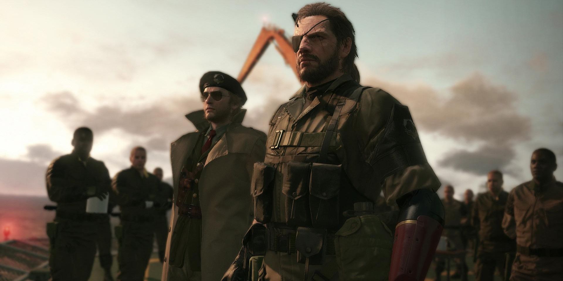 Metal Gear Solid 5: The Phantom Pain Screenshot Of Big Boss Standing With Kaz and Other Soldiers