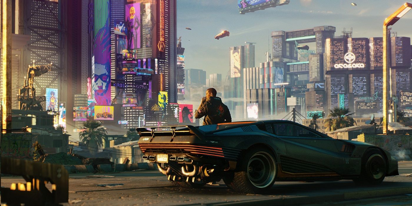 Screenshot of V by his car overlooking a panoramic view of Night City in Cyberpunk 2077.
