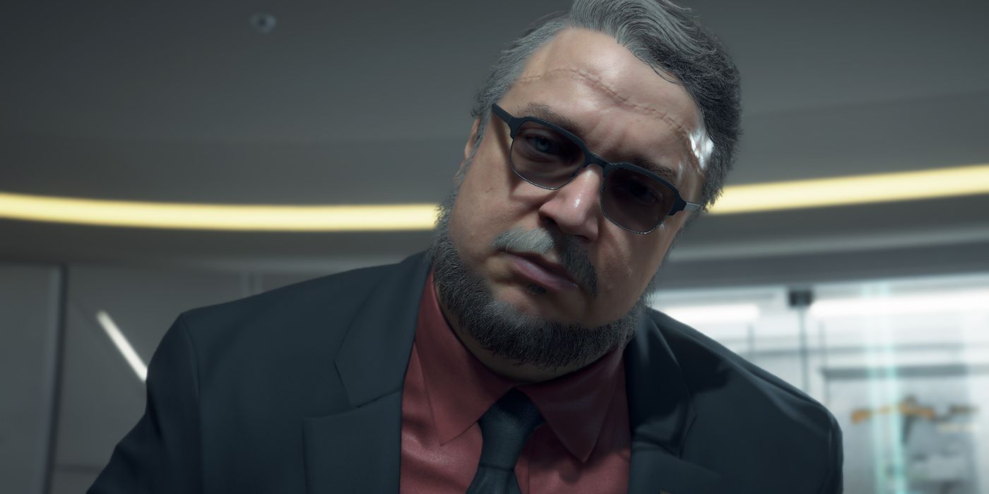 Close-up of Guillermo del Toro's likeness for the character Deadman in Death Stranding, getting a closer look at Sam.