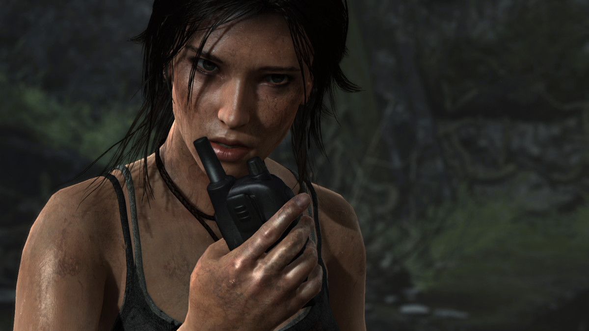 Lara talking into a walkie.