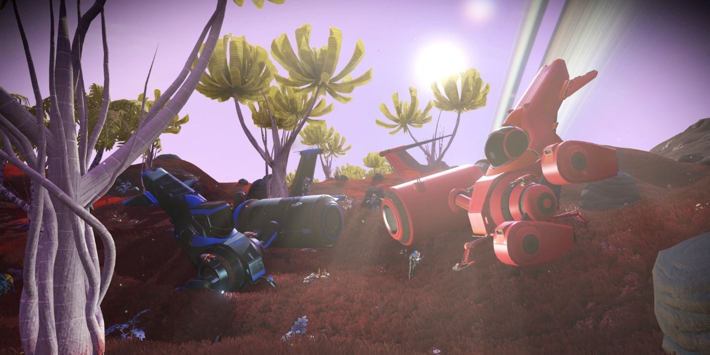 two ships parked next to each other on planet surface by trees