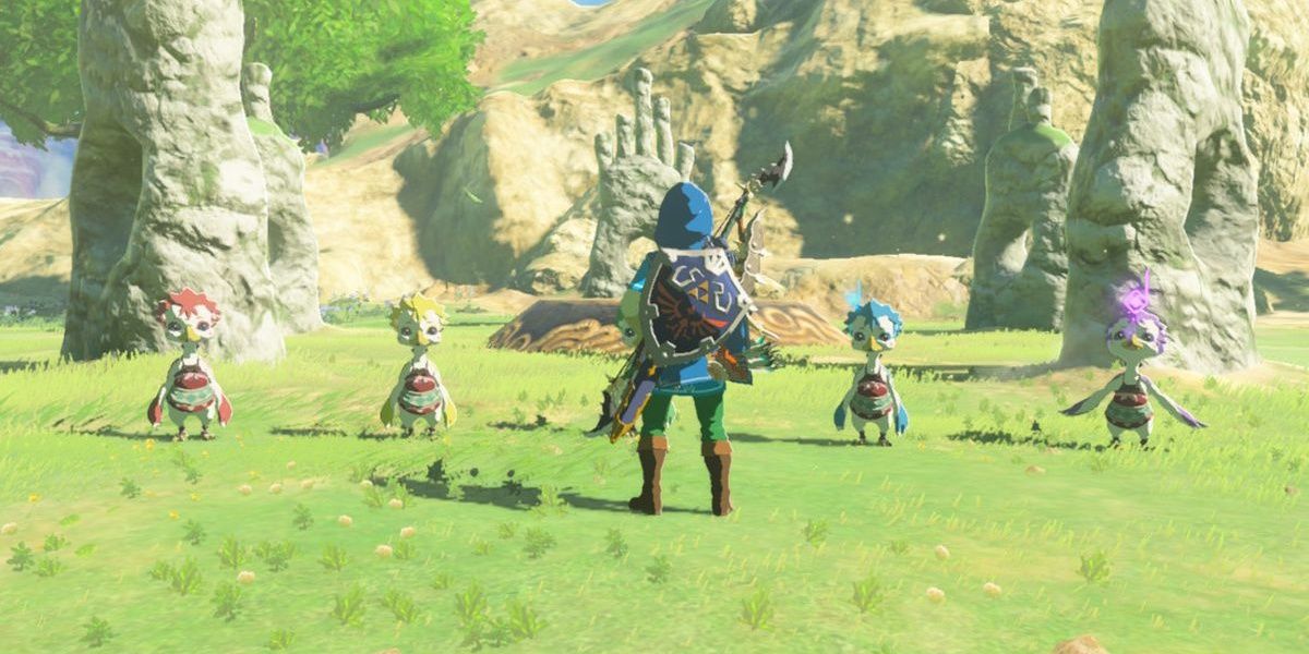 Link standing in front of the Rito children in BOTW