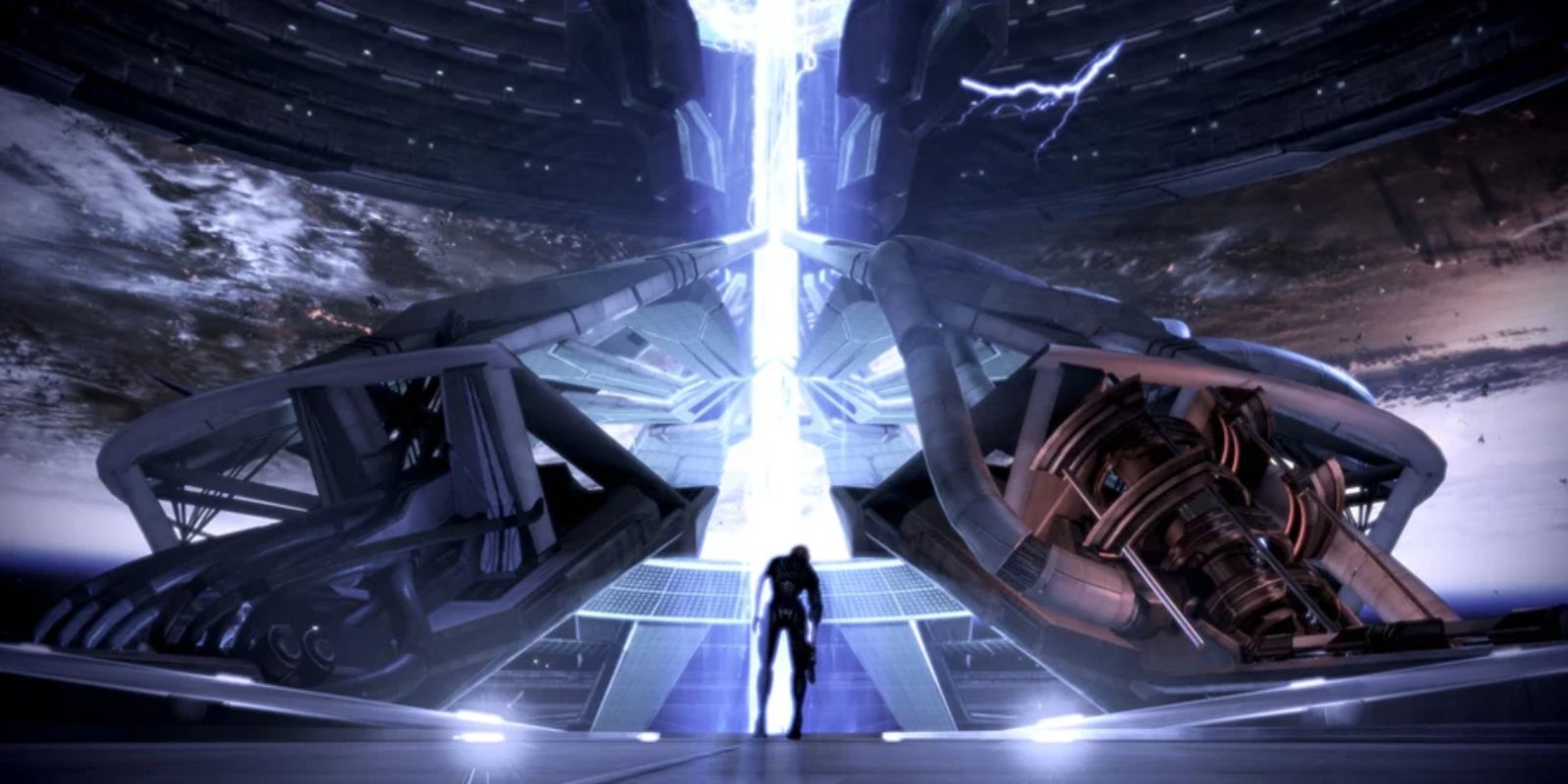 Commander Shepard walking towards a pillar of light in a Mass Effect 3 ending.