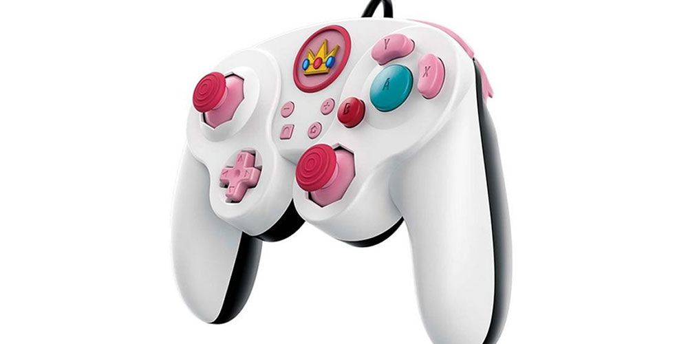 a Princess Peach themed, Gamecube style game controller