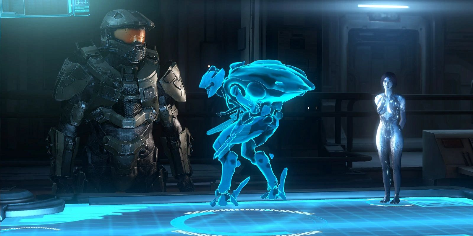 Master Chief and Cortana looking at hologram of a Promethean Knight