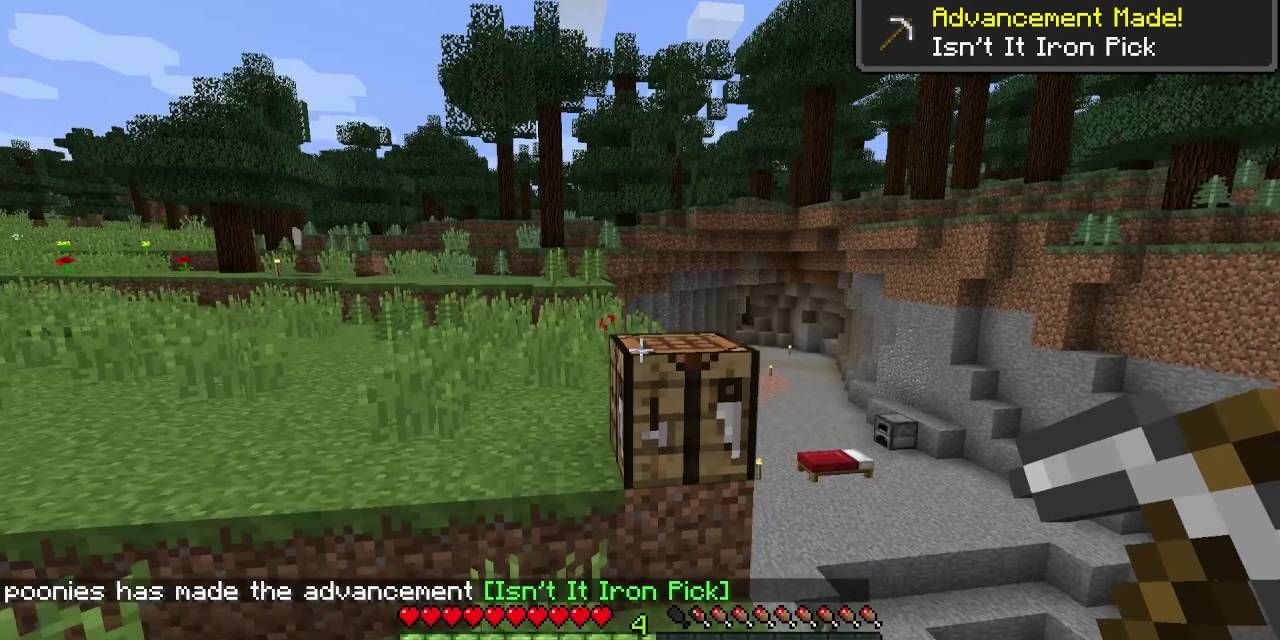 Minecraft Screenshot Of Iron Pickaxe and Crafting Table