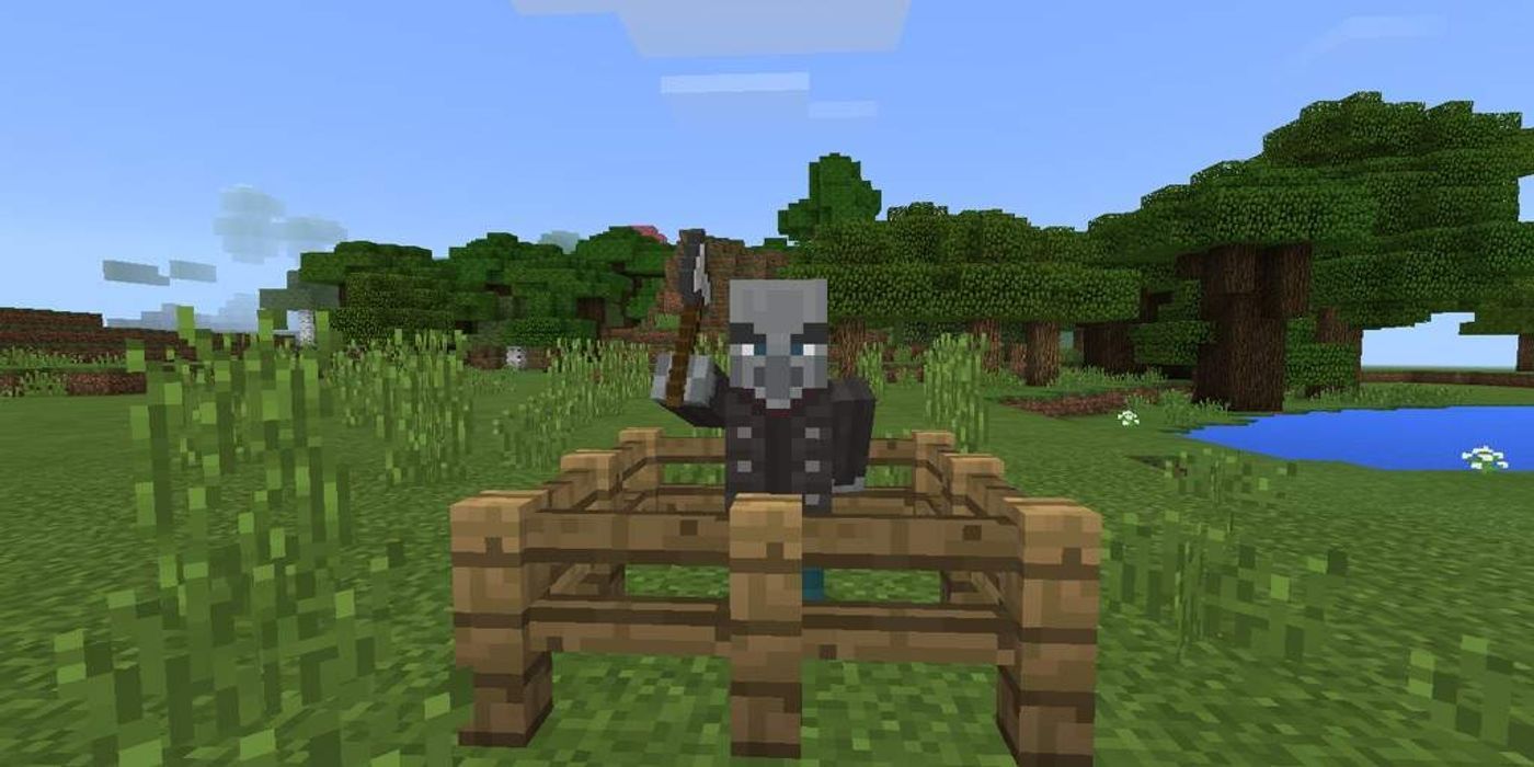 Minecraft: An image of a vindicator trapped in a fenced-in area