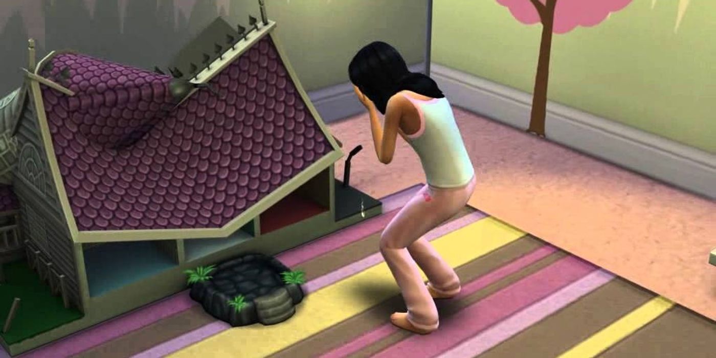 Sim child's dollhouse is destroyed as the child cries