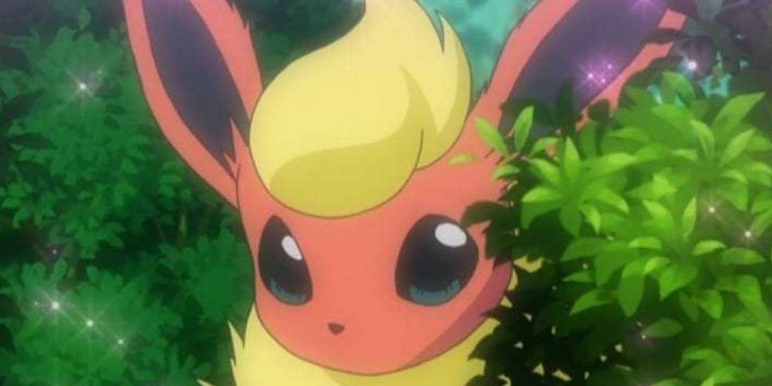 pokemon flareon hiding in a bush