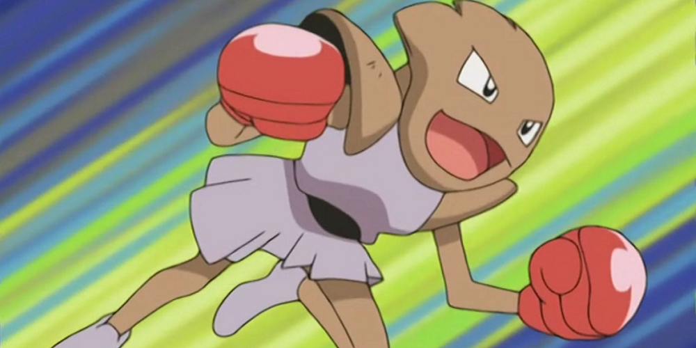 Pokemon: Hitmonchan leaps at its target, fists raised. 
