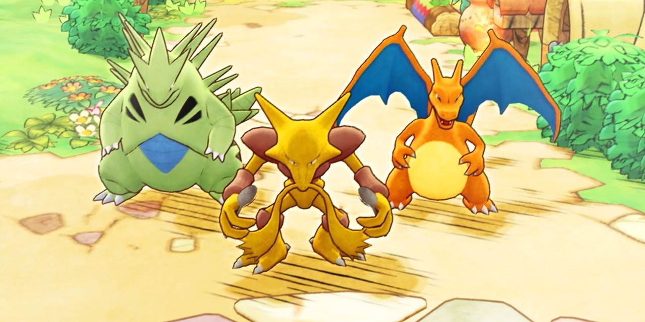 charizard, alakazam, and tyranitar looking imposing