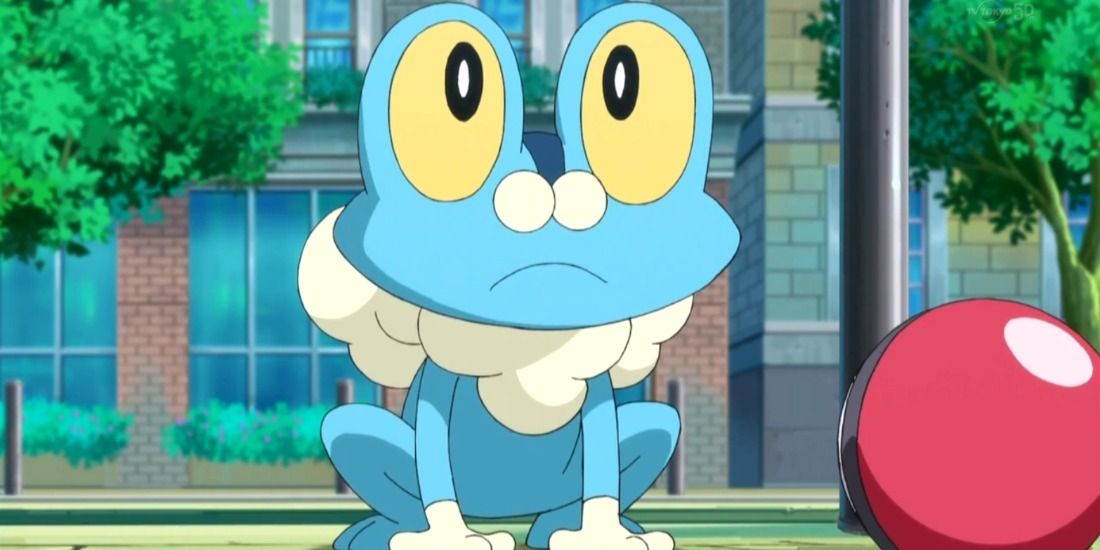 Froakie sitting and looking upwards in the Pokemon anime