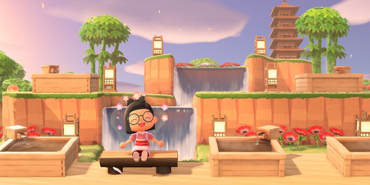 player on a bench by a waterfall