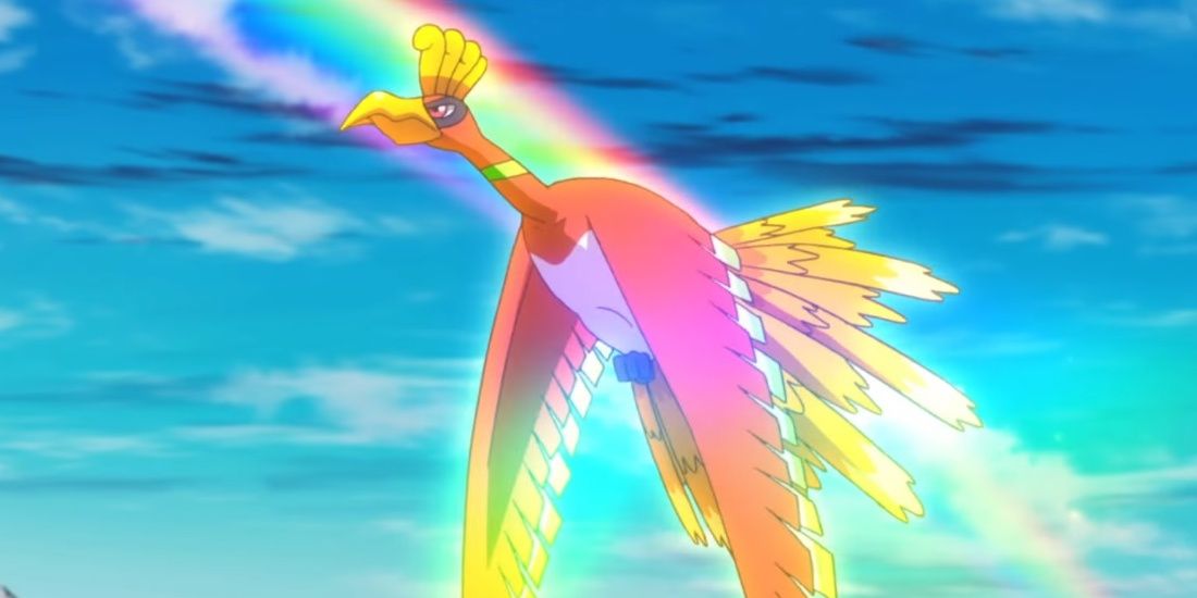 The legendary Pokemon Ho-oh flying in the sky, lit up with the colours of the rainbow.