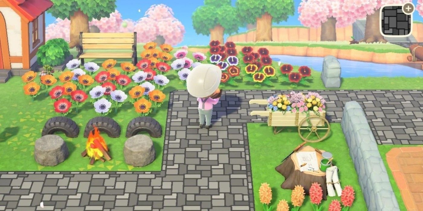 Animal Crossing New Horizons tending flowers