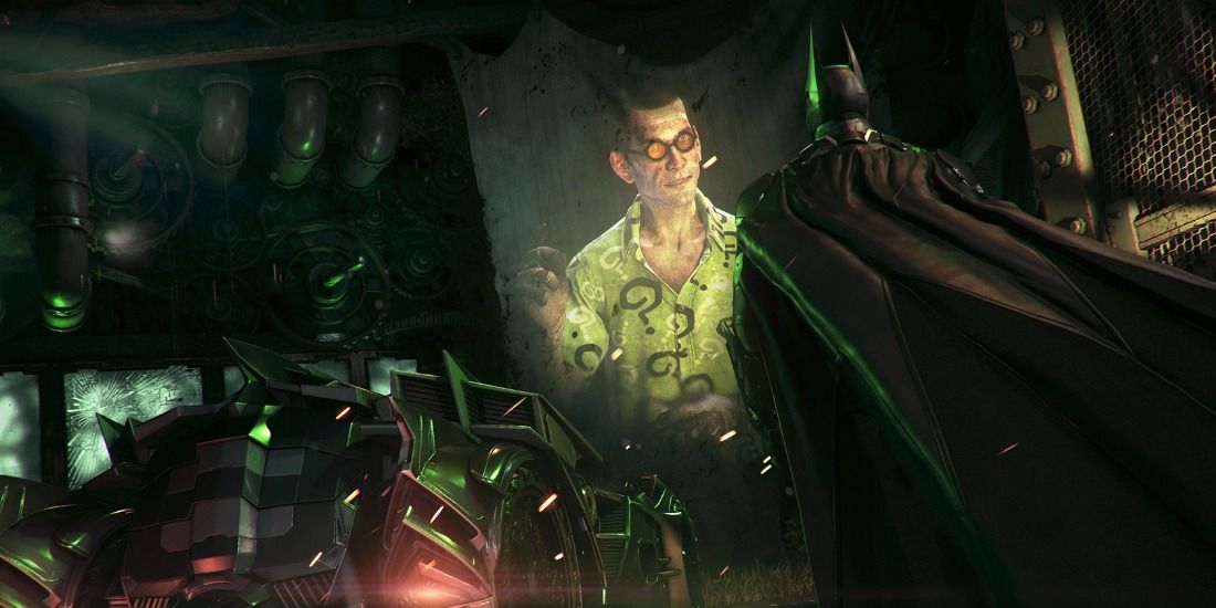Batman looking at projection of the Riddler