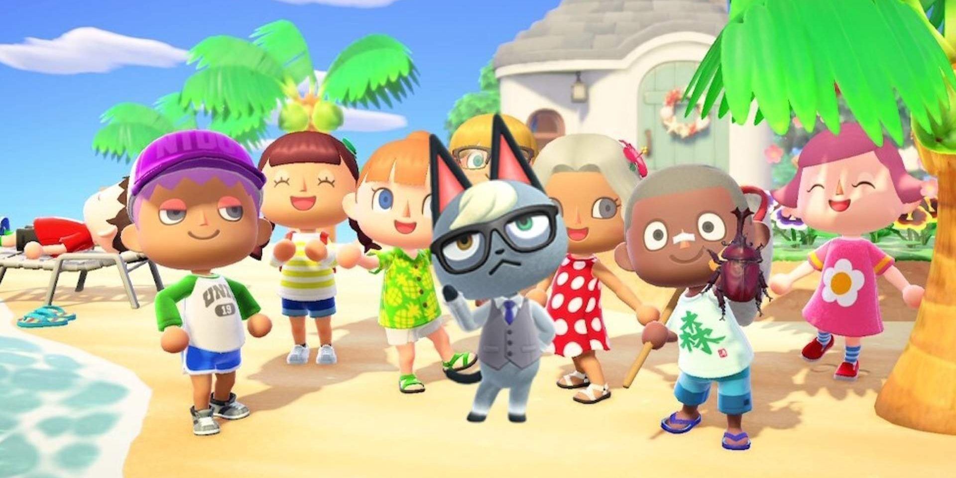 Raymond stands in front of a group of villagers on the beach