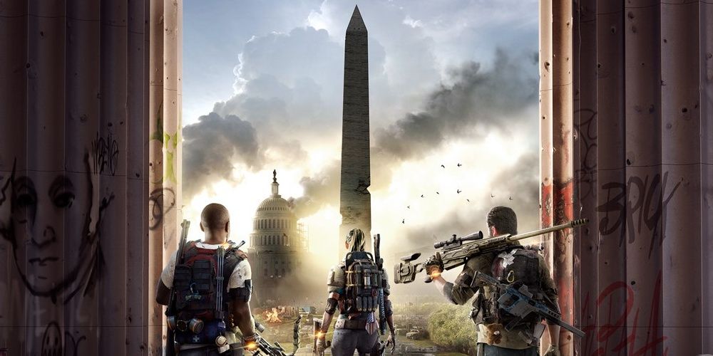 division 2 operatives standing facing out at the washington monument and rotunda with smoke rising in the distance