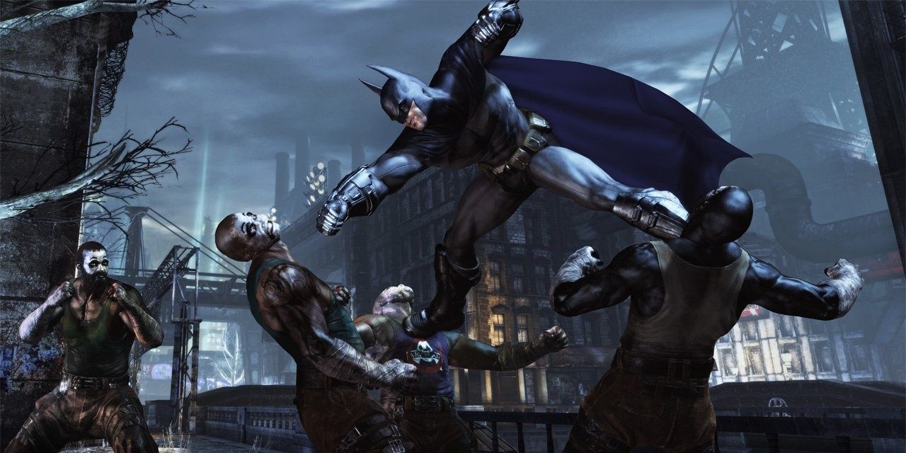 Batman fighting off a group of enemies