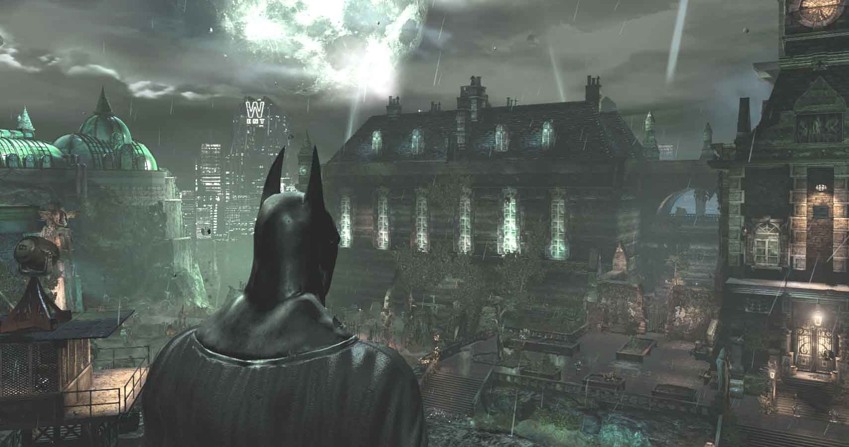 Batman looking down on Arkham Asylum in Batman Return to Arkham
