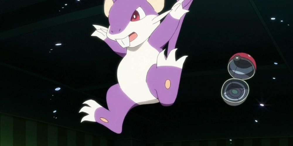 Rattata exiting a Poke Ball in a dark stadium