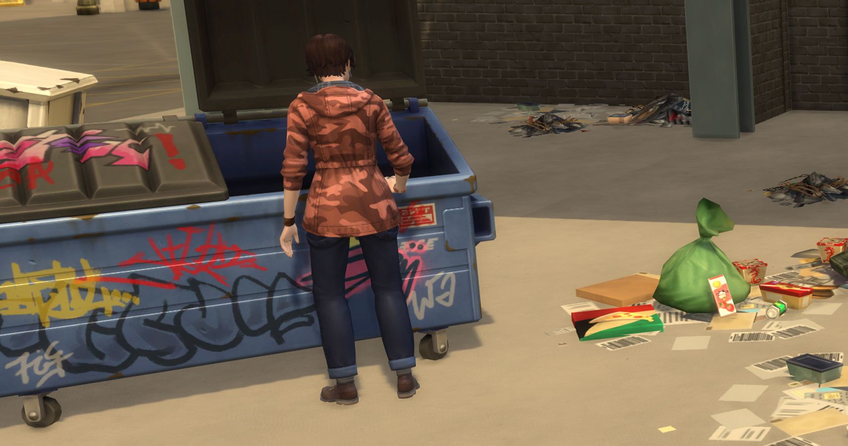 rumaging through trash in a dumpster.