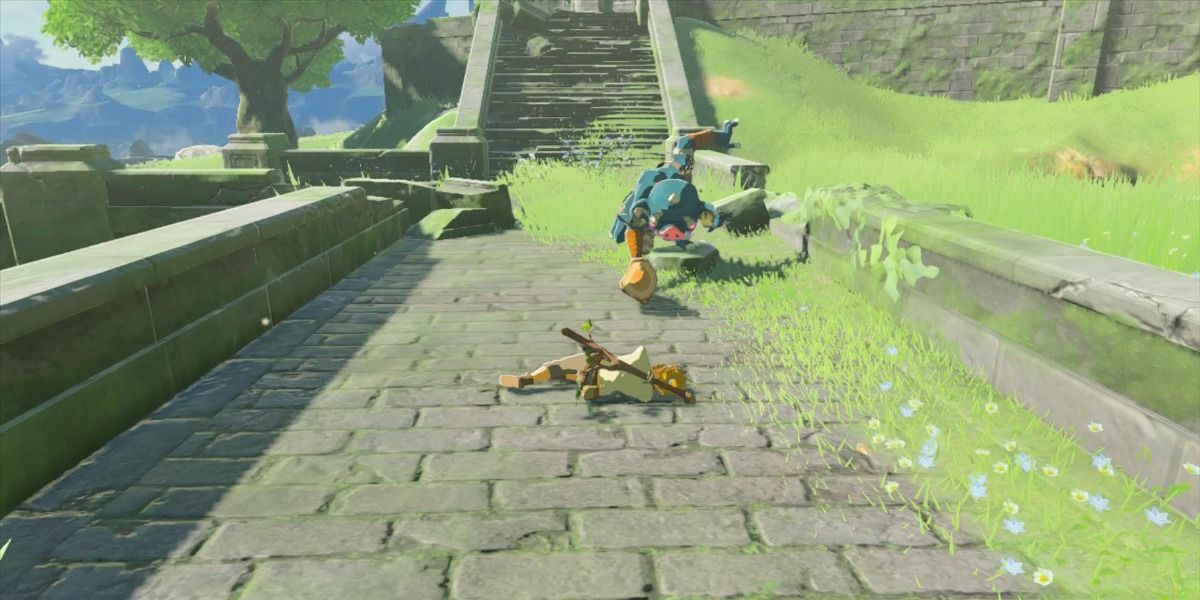 Link is lying on the ground after being hit by a blue Bokoblin