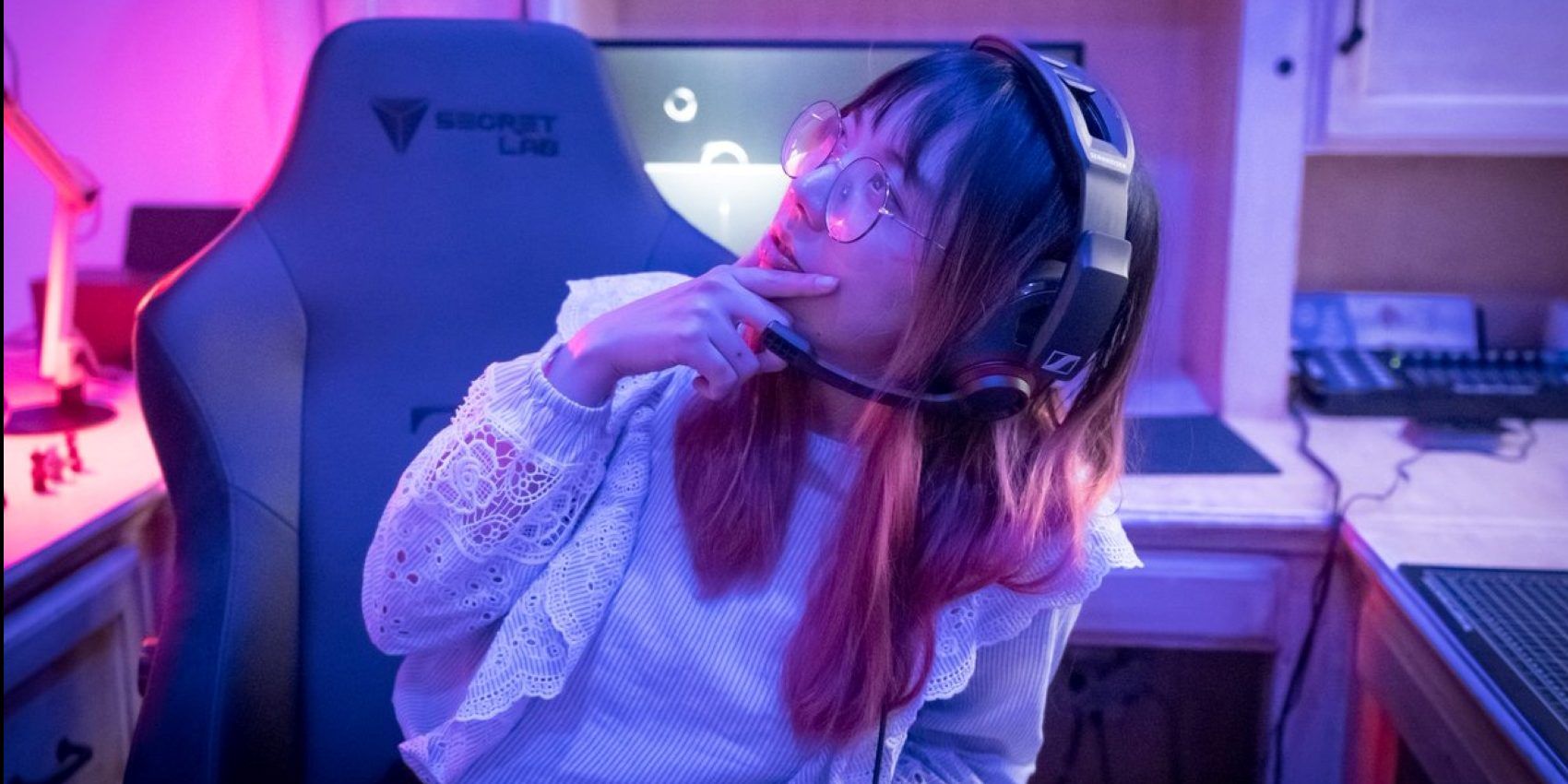 Lilypichu wearing headphones that she is sponsored by