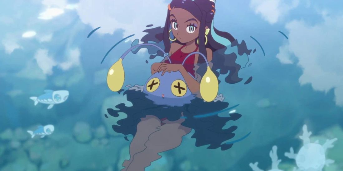 Nessa from Pokemon Sword & Shield swimming in some water with fish and her Pokemon