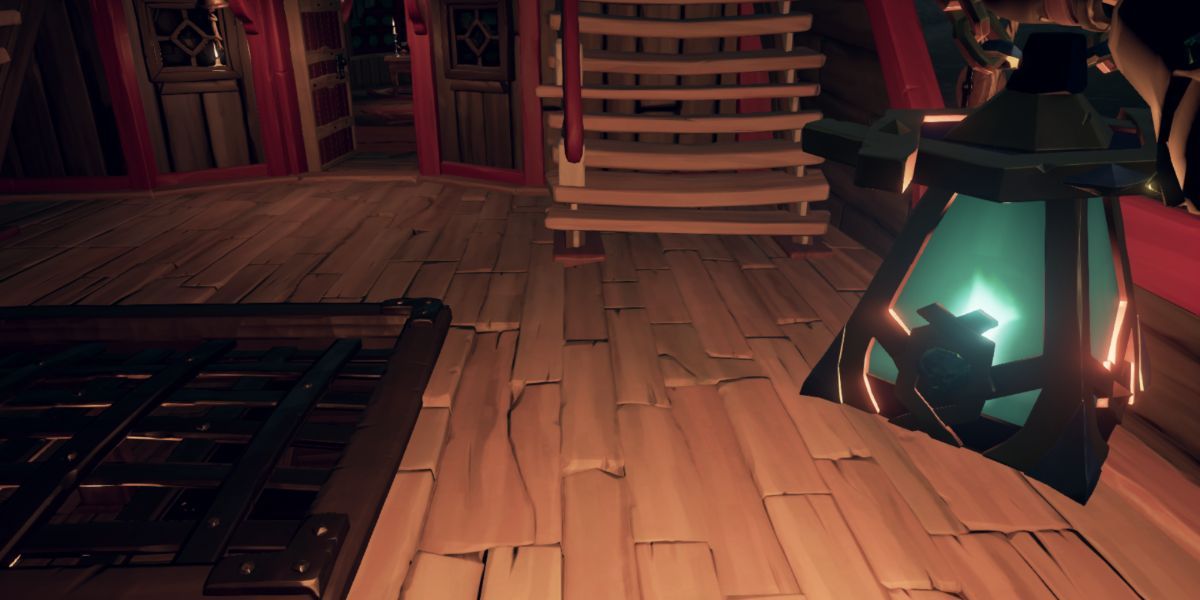 Player Holding A Lantern In Sea Of Thieves