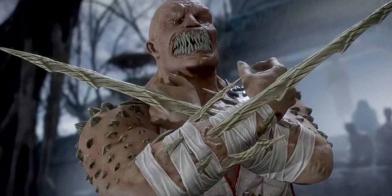 Mortal Kombat Baraka wielding his built in weapon daggers during a fight. 