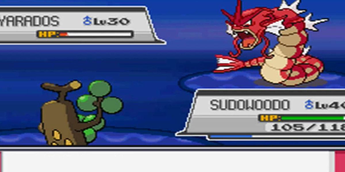 A shiny Gyarados fighting a Sudowoodo in Pokemon