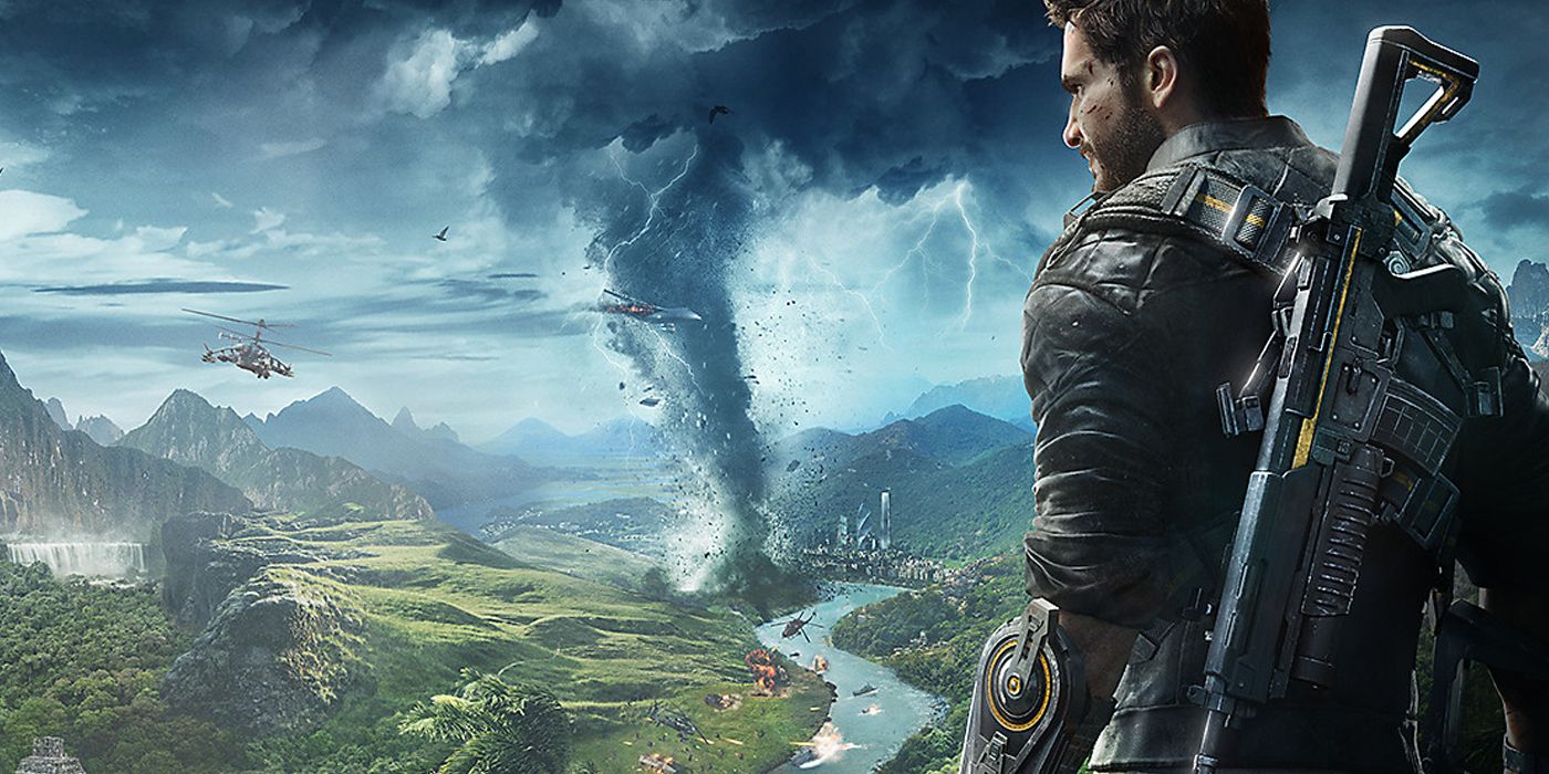The main character looks toward a cloud of smoke while standing on a mountain in Just Cause 4