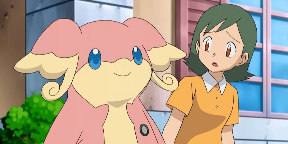 Audino next to a girl