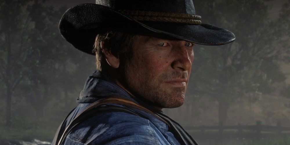 Red Dead Redemption 2 Arthur Morgan side profile with the signature black hat and blue shirt.