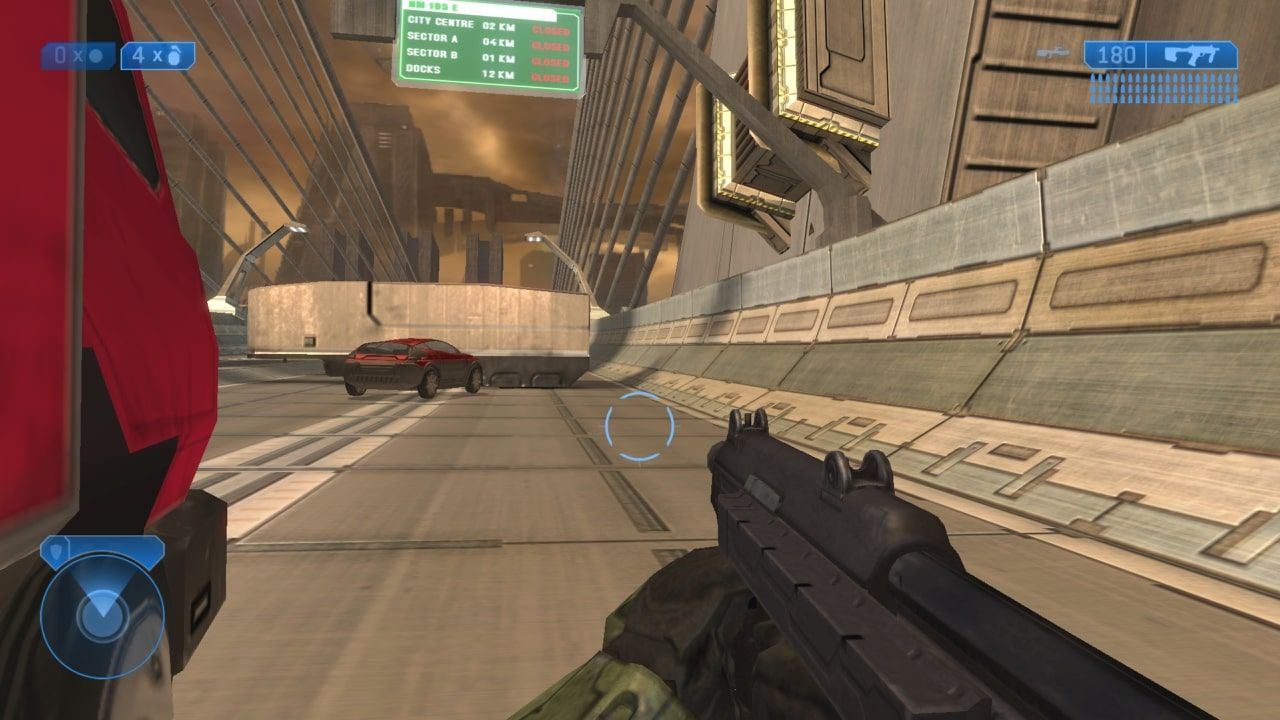 Halo 2 Crouching Beside A Red Truck On A Bridge