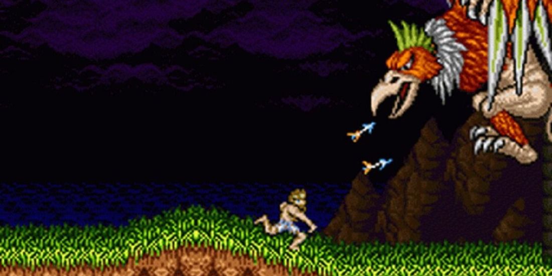 Arthur fighting a dinosaur in Super Ghouls'n Ghosts