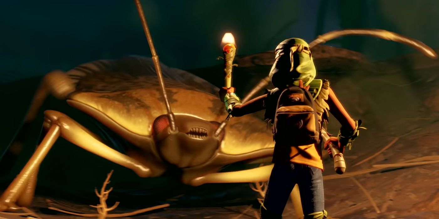 A large bug roars at the main character, who is holding a torch.