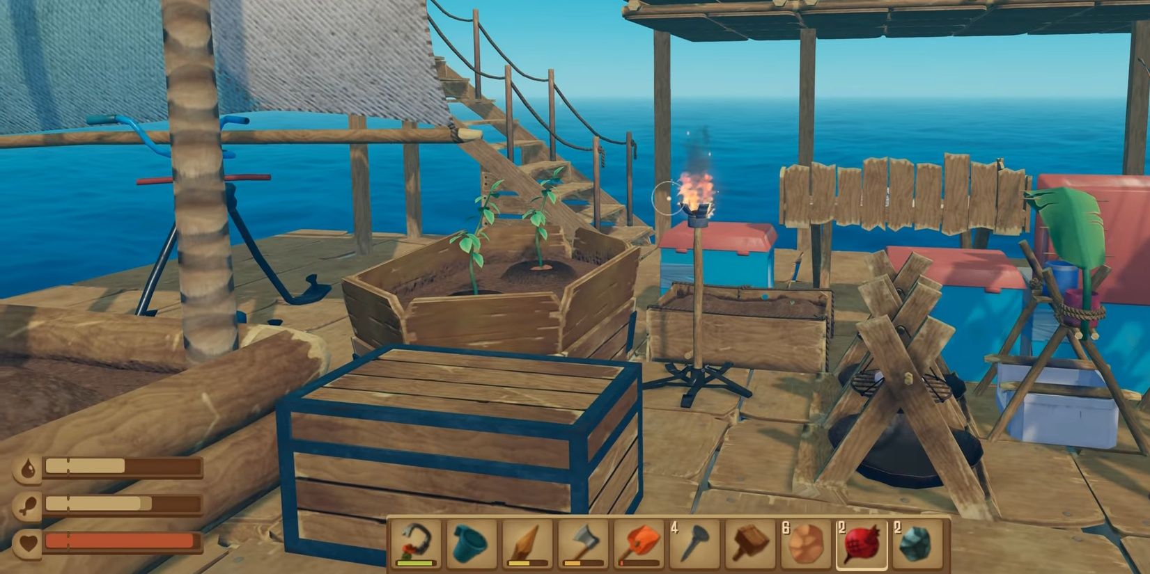 raft gameplay, looking at a sail, chest, torch and the sea