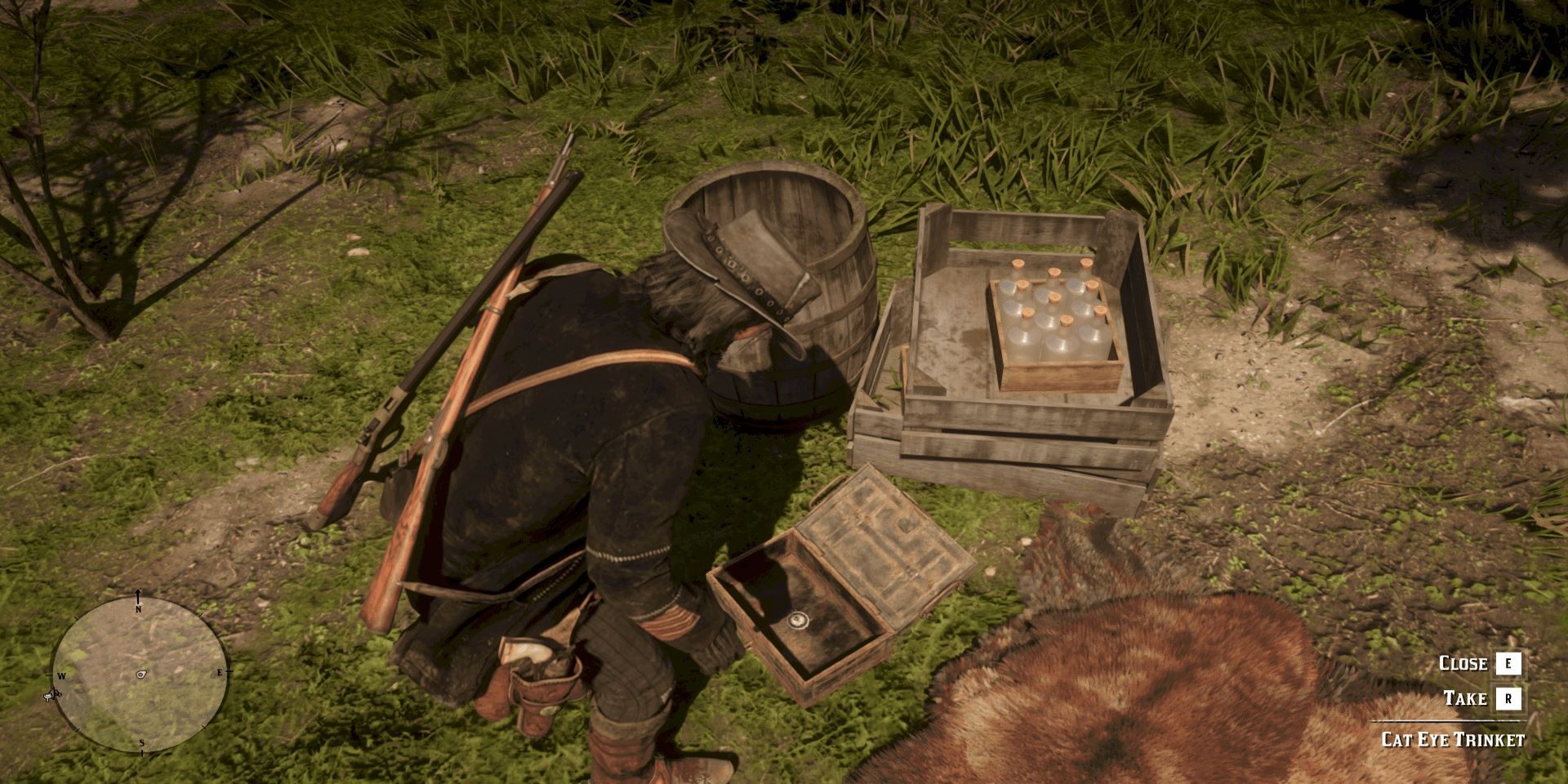 Red Dead Redemption 2 - arthur looks in a treasure chest he's found