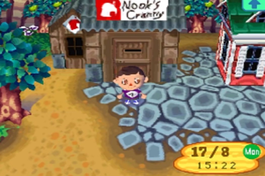 The player character outside Nook's Cranny in Animal Crossing: Wild World
