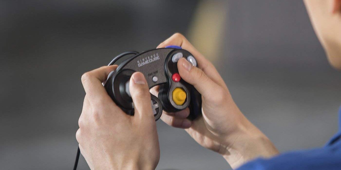 Person Holding GameCube Controller