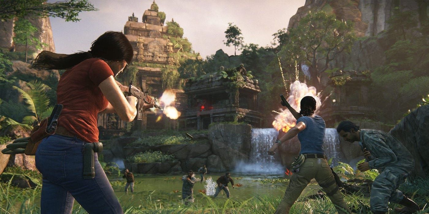 Uncharted Lost Legacy Chloe and Nadine shooting at enemy soldiers near a waterfall by a temple lush with greenery.