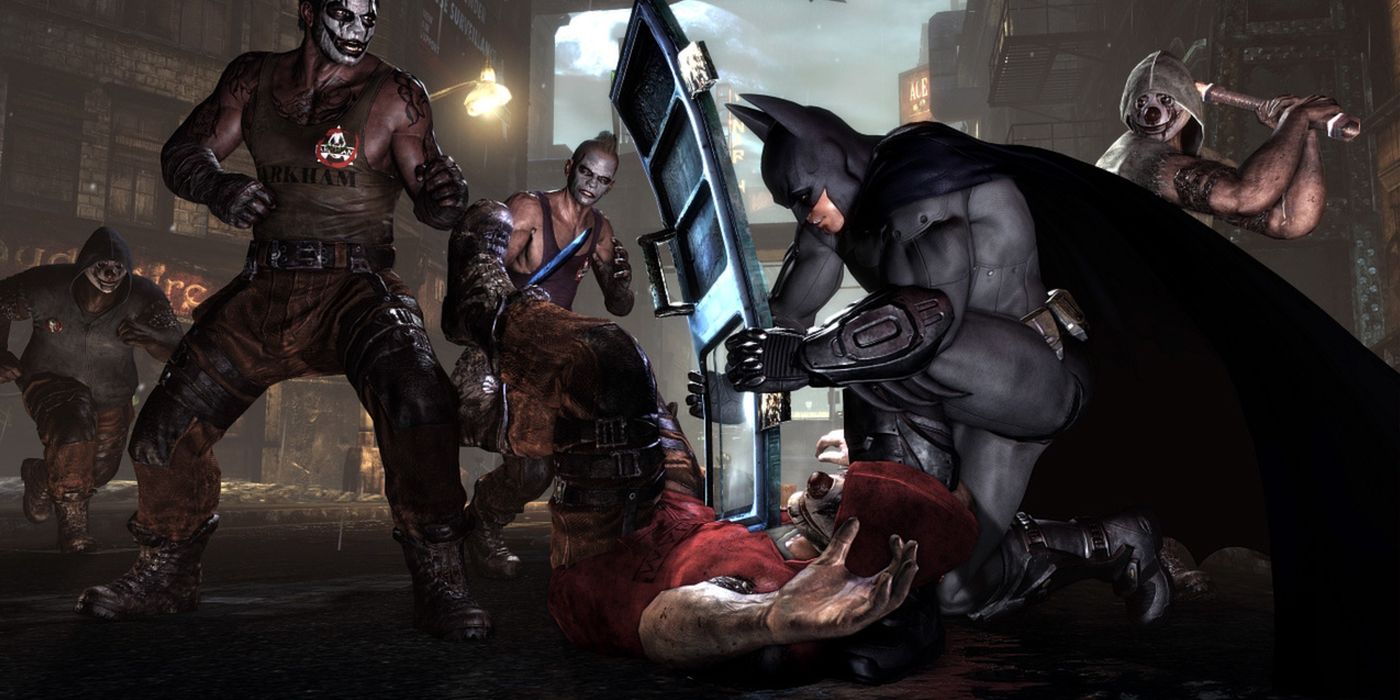 Batman fighting Arkham goons in Arkham City.