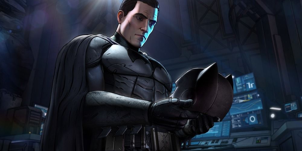 Screenshot of Batman: The Telltale Series of Bruce Wayne holding his mask